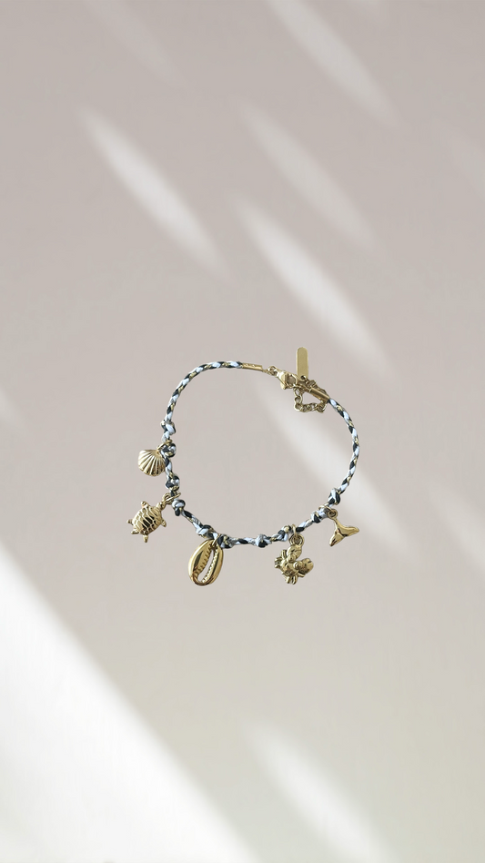 Bracelet charm’s blanc/noir