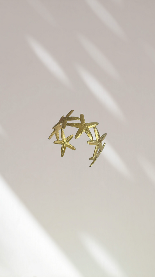 Bracelet manchette étoiles