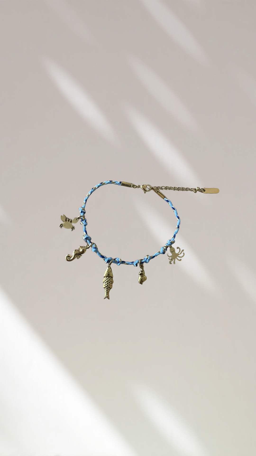 Bracelet charm’s bleu